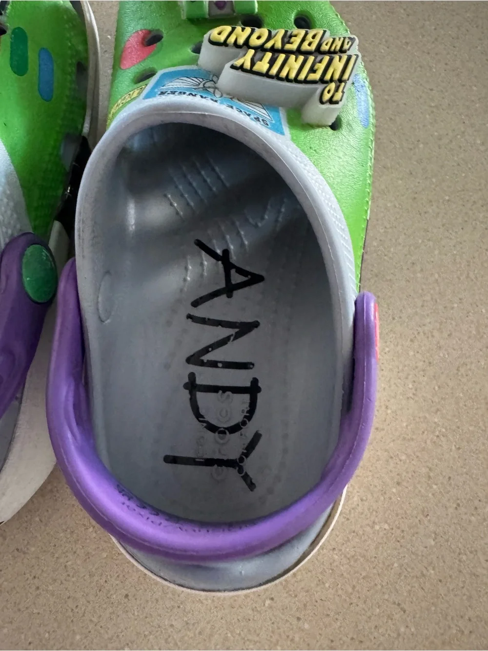 CROCS Kids Green Clogs with Purple Heel Strap and Space Charms